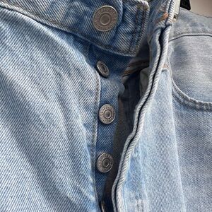 Levi’s 501 distressed button fly